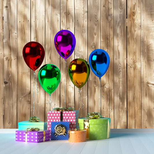 Five colorful balloons and several gift boxes with bows are arranged in front of ideasbackdrop's Brown Wood Backdrops for Photography Vintage Brown Background Baby Shower Birthday Photo Booth Studio Props, showcasing the exquisite details made possible by high-resolution printing technology.