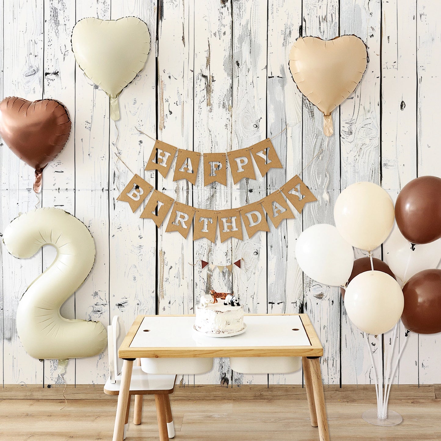 A birthday setup with heart-shaped balloons, a large number 2 balloon, a cake on a small table, and a "Happy Birthday" banner against an ideasbackdrop Wood Backdrop Retro Rustic White Gray Wooden Floor Background for Photography Kids Photo Booth Video Shoot Studio Prop.