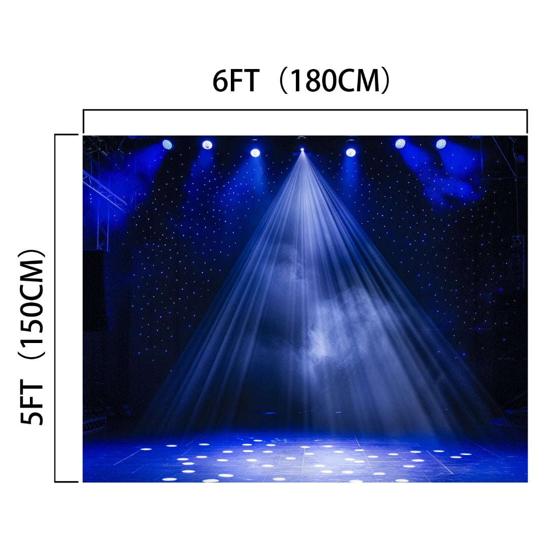 A stage is illuminated by blue spotlights, forming a central beam with fog effects. Enhanced with a ideasbackdrop 7x5FT Stage Spotlight Backdrop Concert Gloomy Night Scenic Photography Background Portrait Studio Props, the setup measures 6 feet (180 cm) in width and 5 feet (150 cm) in height—ideal for mesmerizing photography props.