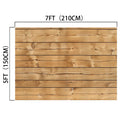 This 7x5ft Retro Wood Graduate Wall Background Wooden Backdrop Studio Props for Baby Shower Birthday Photography by ideasbackdrop, measuring 7 feet (210 cm) in length and 5 feet (150 cm) in height, is crafted from several horizontal planks.