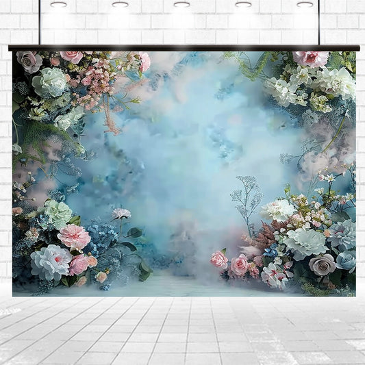 A photogenic masterpiece, this Blue Wall Bridal Shower Portrait Backdrop -ideasbackdrop from ideasbackdrop features a blend of various flowers in soft pastel colors, including pink, white, and blue, set against a serene, misty blue background and framed by a brick wall.