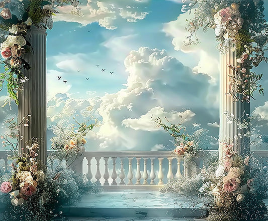 A scenic view of a balcony with ornate columns and a Bridal Shower Wedding Sky Floral Backdrop -ideasbackdrop, overlooking a vast sky filled with fluffy clouds and distant birds by ideasbackdrop.