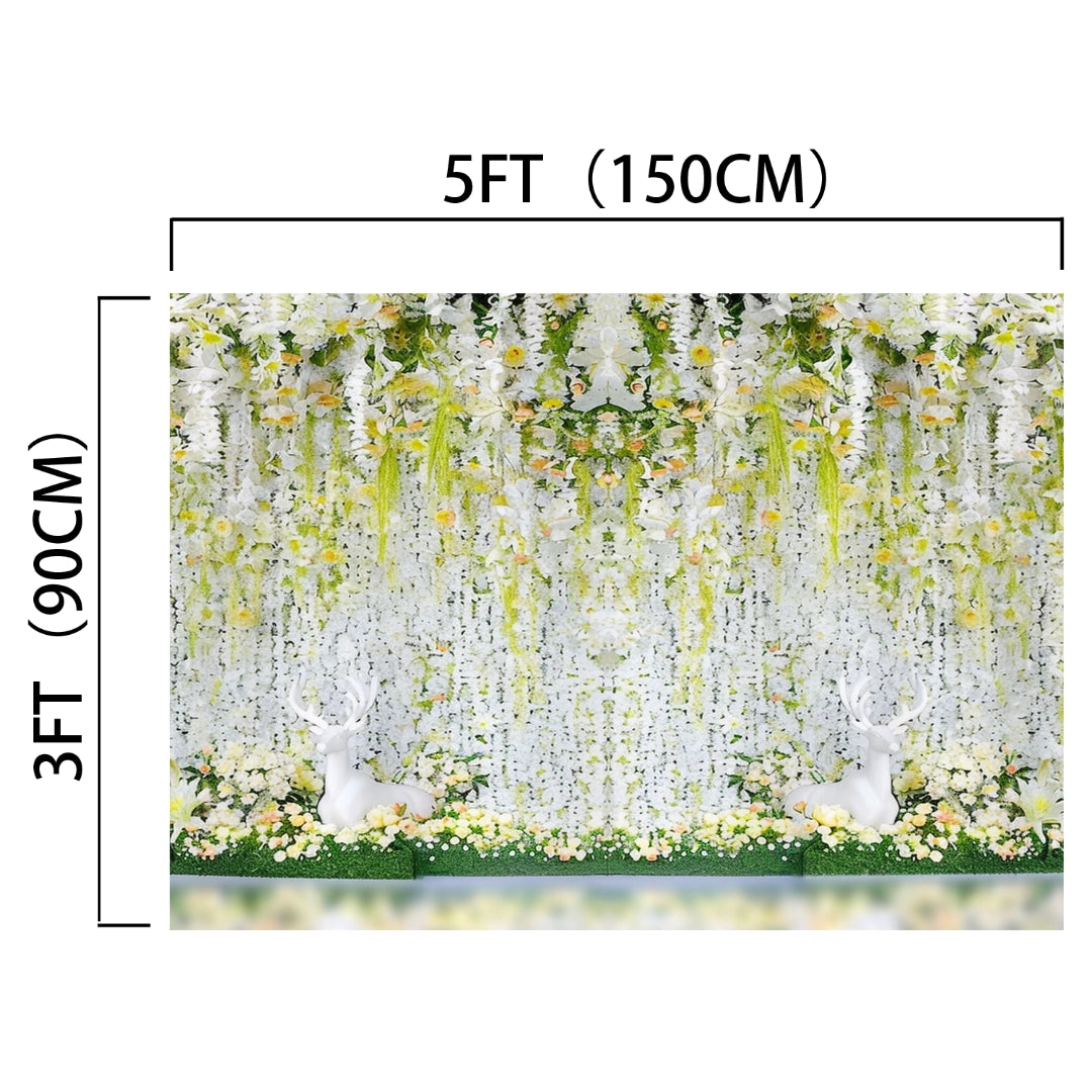 Backdrop measuring 5ft (150cm) by 3ft (90cm), featuring white flowers, greenery, hanging garlands, and two white deer figures—perfect for an unforgettable celebration. The Bridal Shower Flower Party Wedding Backdrop-ideasbackdrop by ideasbackdrop is an ideal HD Vivid Wedding Backdrop that elevates your wedding decor to new heights.