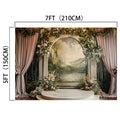 Backdrop with floral and greenery decorations, depicting a scenic landscape with mountains and a lake, framed by drapes and an archway. Perfect for weddings or photo sessions, this Bridal Shower Photography Floral Background -ideasbackdrop by ideasbackdrop measures 7 feet (210 cm) wide and 5 feet (150 cm) high.