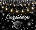A black and white graduation cap with the word "Congratulations" and string lights above, perfect for adding a professional look to your graduation photography, is the Congrats Grad Photography Graduation Backdrop by ideasbackdrop.
