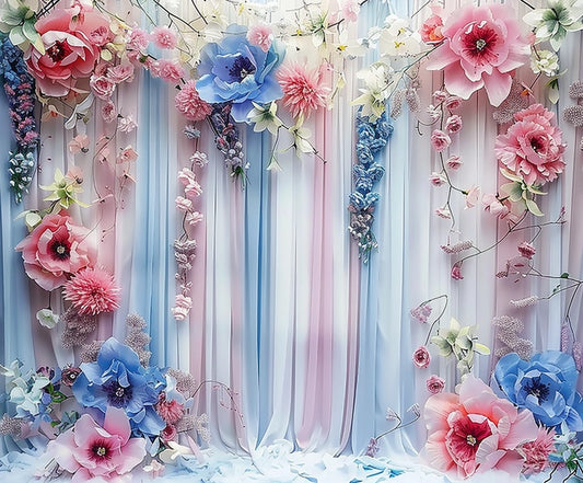 A backdrop of pink, blue, and white paper flowers with long vertical drapes in matching colors adds an Elegant Floral Photography Backdrop -ideasbackdrop perfect for special occasions. Small flowers and petals are scattered on the ground, creating a blooming garden effect.