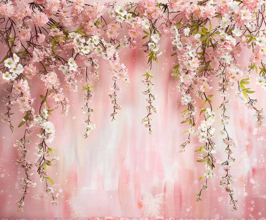 A floral masterpiece, pink cherry blossom branches hang gracefully against a pastel pink background with scattered petals below—an ideal Elegant Rose Wedding Bridal Flower Backdrop by ideasbackdrop for your wedding decoration.