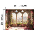 An European Style Window Flower Backdrop - ideasbackdrop featuring a floral archway overlooking a scenic mountain landscape, measuring 5 feet (150 cm) wide and 3 feet (90 cm) tall. Perfect for weddings and special events.
