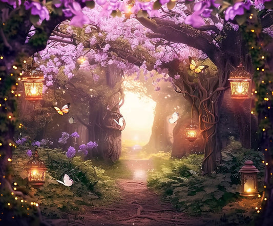 A lush forest pathway is illuminated by hanging lanterns with glowing fireflies and butterflies fluttering amidst blossoming trees and purple flowers, creating a Fairy Enchanted Fairytale Flower Backdrop -ideasbackdrop by ideasbackdrop.