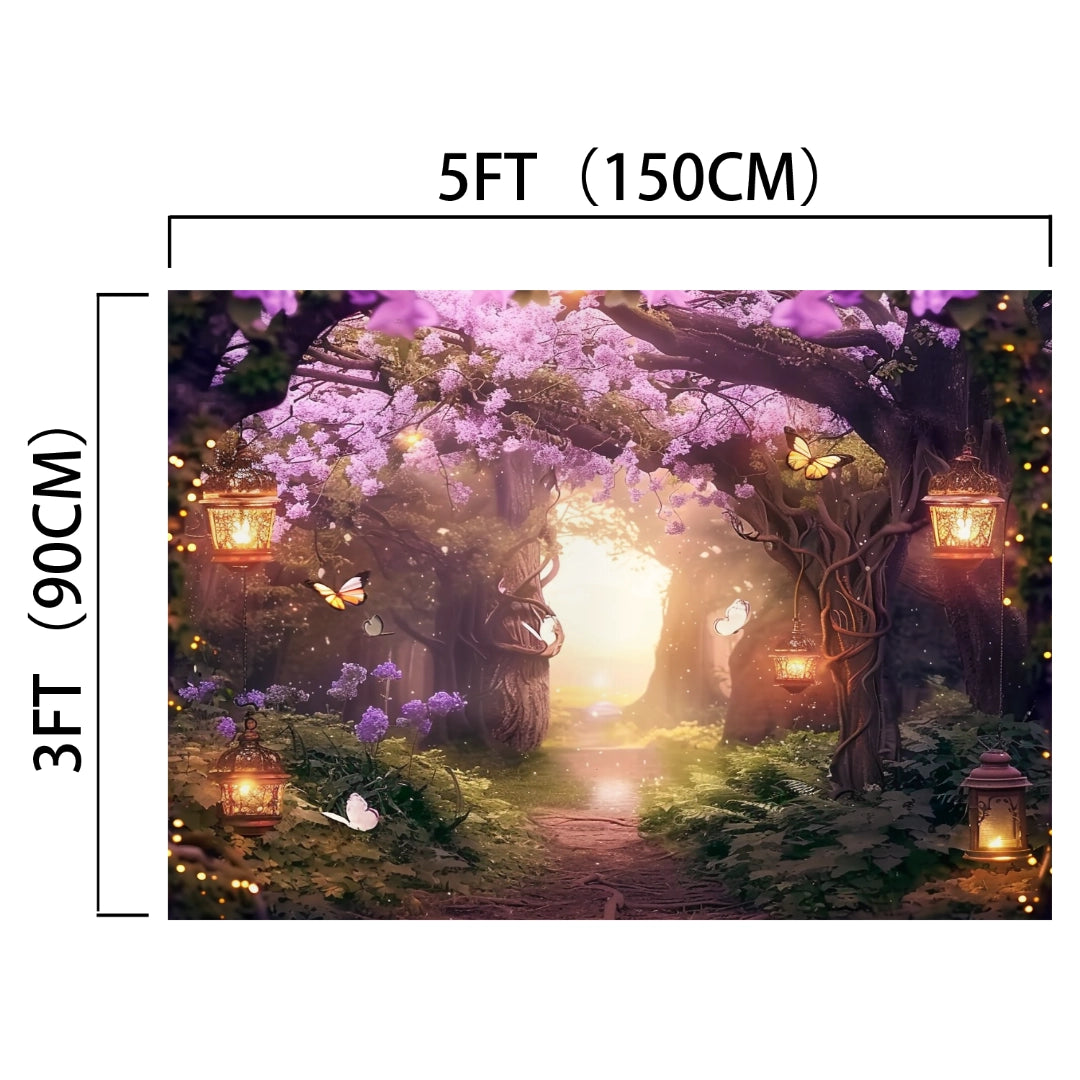 A 5ft by 3ft Fairy Enchanted Fairytale Flower Backdrop - ideasbackdrop depicts a whimsical forest scene. It features lanterns hanging from trees, butterflies, and a path leading towards a bright, magical light amid high-definition flowers and vibrant garden foliage.