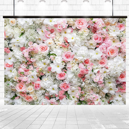 A wall covered with a dense arrangement of various pink, white, and cream-colored life-like flowers, including roses and hydrangeas, creates an exquisite Pink White Rose Wall Flower Backdrop for Party - ideasbackdrop perfect for weddings in an indoor setting.