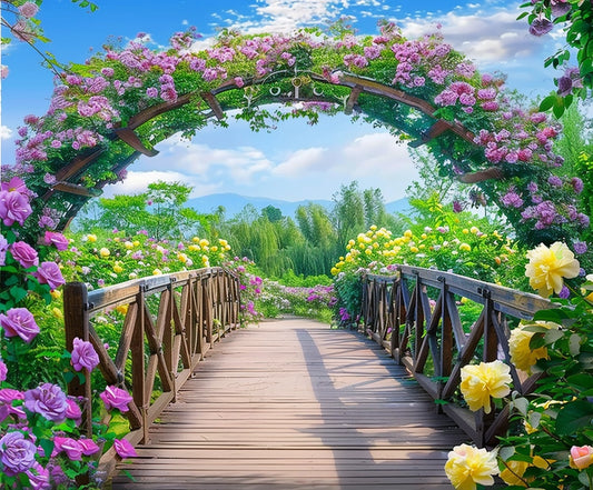 A Flowers Blossom Wooden Bridge Floral Backdrop-ideasbackdrop adorned with colorful flowers arches over a lush garden, creating a vivid floral backdrop. With HD quality, the scenic view of trees and mountains in the background under a partly cloudy sky makes it perfect for weddings.