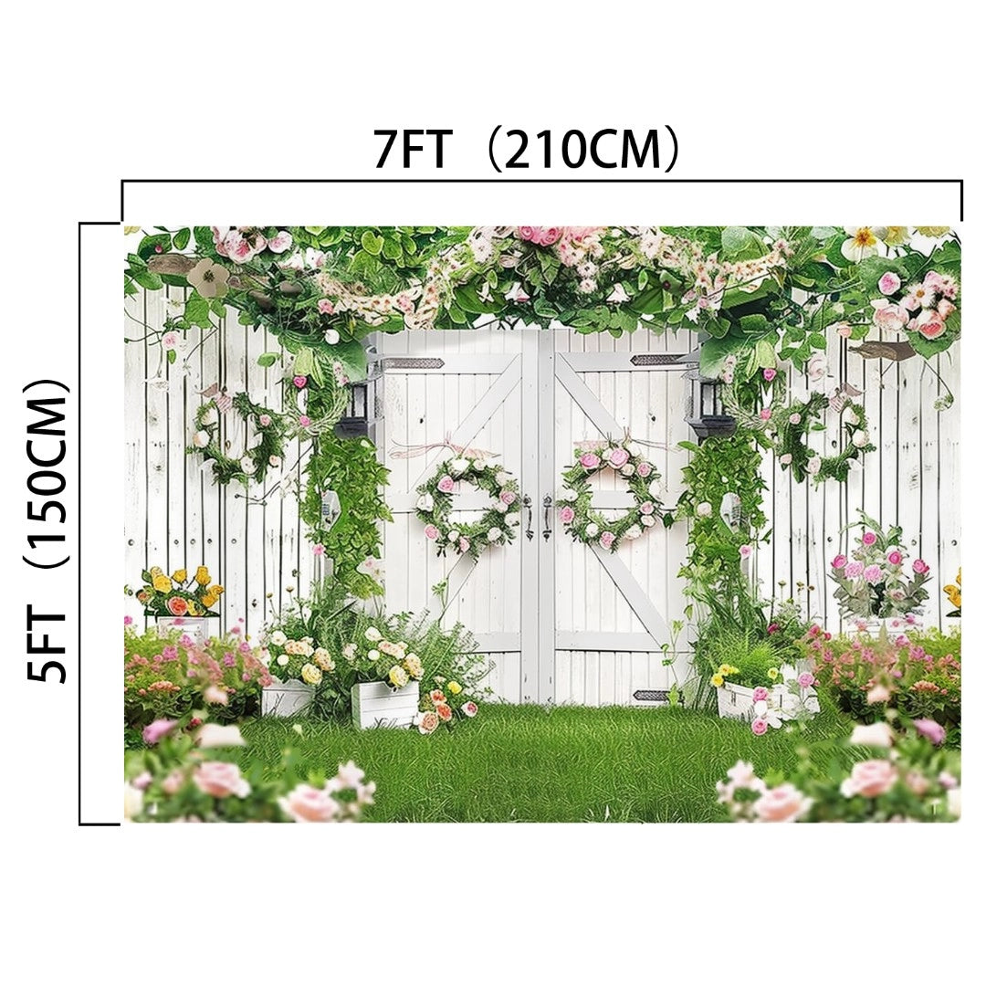 White wooden gate decorated with green vines and pink flowers, perfect as a Green Leaves Butterfly Spring Floral Backdrop -ideasbackdrop for your wedding ceremony. Measurements labeled as 7 feet (210 cm) wide and 5 feet (150 cm) tall. The garden scene, complete with potted plants and grass in the foreground, creates an HD floral backdrop by ideasbackdrop.
