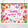Colorful Mother's Day banner with tulips, butterflies, and hearts on a white wooden background. Text in the center reads "Happy Mother's Day" in a bright pink script font. Perfect for creating lasting memories as a Wood Floral Happy Mother's Day Backdrop-ideasbackdrop for photos & gatherings by ideasbackdrop.