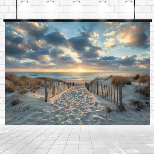 A sandy path flanked by wooden fences leads to a beach with calm waves and a sunset sky filled with scattered clouds, creating a Hawaii Sun Sky Ocean Photo Beach Backdrop - ideasbackdrop perfect for photography.