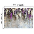A Lavender Floral Bridal Photo Studio Backdrop -ideasbackdrop measuring 7 feet (210 cm) wide and 5 feet (150 cm) tall, featuring an arrangement of lifelike purple, white, and pink flowers cascading from the top.