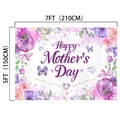 A rectangular sign with floral decorations, butterflies, and gemstones creates a picture-perfect display. The text reads "Happy Mother's Day" in the center. Dimensions are 7 feet (210 cm) by 5 feet (150 cm), making it an ideal HD backdrop for your celebration. This is the Purple Floral Butterfly Happy Mothers Day Backdrop-ideasbackdrop by ideasbackdrop.