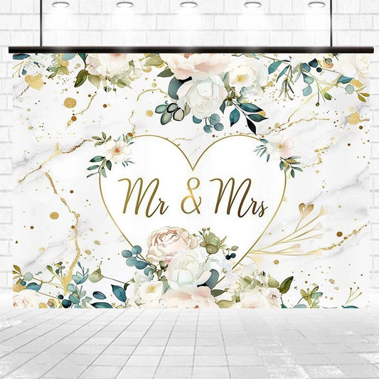 A Mr and Mrs Floral Hearts Wedding Backdrop-ideasbackdrop with "Mr & Mrs" written inside a heart, surrounded by white and pink flowers and green foliage, set against a marble-like background with gold accents, perfect for any wedding theme.