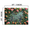 A 5ft by 3ft (150cm by 90cm) Outdoor Grass Wedding Floral Backdrop - ideasbackdrop with pink and orange flowers and green leaves surrounding a central green space, offering natural elegance.