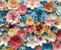A variety of colorful paper flowers in pink, blue, yellow, and white are arranged closely together. Each flower has distinct petals and textures, creating a vibrant and intricate Paper Background Flower Backdrop for Photography -ideasbackdrop perfect for wedding planners and event organizers looking to add a touch of elegance to their events.