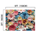 A colorful HD floral backdrop featuring variously sized and shaped paper flowers in pink, blue, yellow, and white, measuring 5 feet (150 cm) by 3 feet (90 cm), perfect for wedding planners and event organizers seeking a vibrant touch. Introducing the Paper Background Flower Backdrop for Photography - ideasbackdrop by ideasbackdrop.