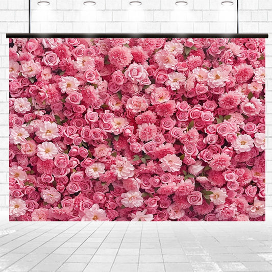 Display of a lush, pink, rose flower wall perfect for weddings and photo shoots, with a variety of rose and peony blossoms arranged densely against an HD floral backdrop resembling a brick wall. Introducing the Pink Flower Wedding Floral Wall Backdrop - ideasbackdrop by ideasbackdrop.