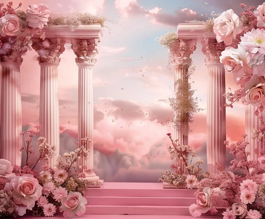 A dreamy, pastel-hued scene with classical columns adorned with pink and white flowers, perfect for a photo session. The cloudy sky seamlessly blends from pink to blue, creating an enchanting **Pink Sky Photo Studio Props Floral Backdrop-ideasbackdrop** in HD quality by **ideasbackdrop**.