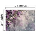 A 5 feet by 3 feet Purple Lilac Blooming Wall Flower Backdrop - ideasbackdrop featuring purple and white flowers on a textured gray and lavender gradient background, creating a stunning floral masterpiece.
