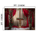 A decorated space measuring 7 feet by 5 feet features a gold pedestal surrounded by red and green floral arrangements, draped with red and white curtains and string lights, creating the perfect Red Floral Wedding Bridal Shower Backdrop - ideasbackdrop from ideasbackdrop.