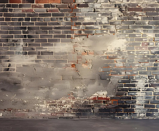 A Vintage Distressed Brick Wall Backdrop for Photography Portrait Background Studio Props from ideasbackdrop with sections of varying shades and areas of gray and white paint splatters. The surface has visible cracks and chipped bricks, perfect for photo studio photography or high-resolution printing.