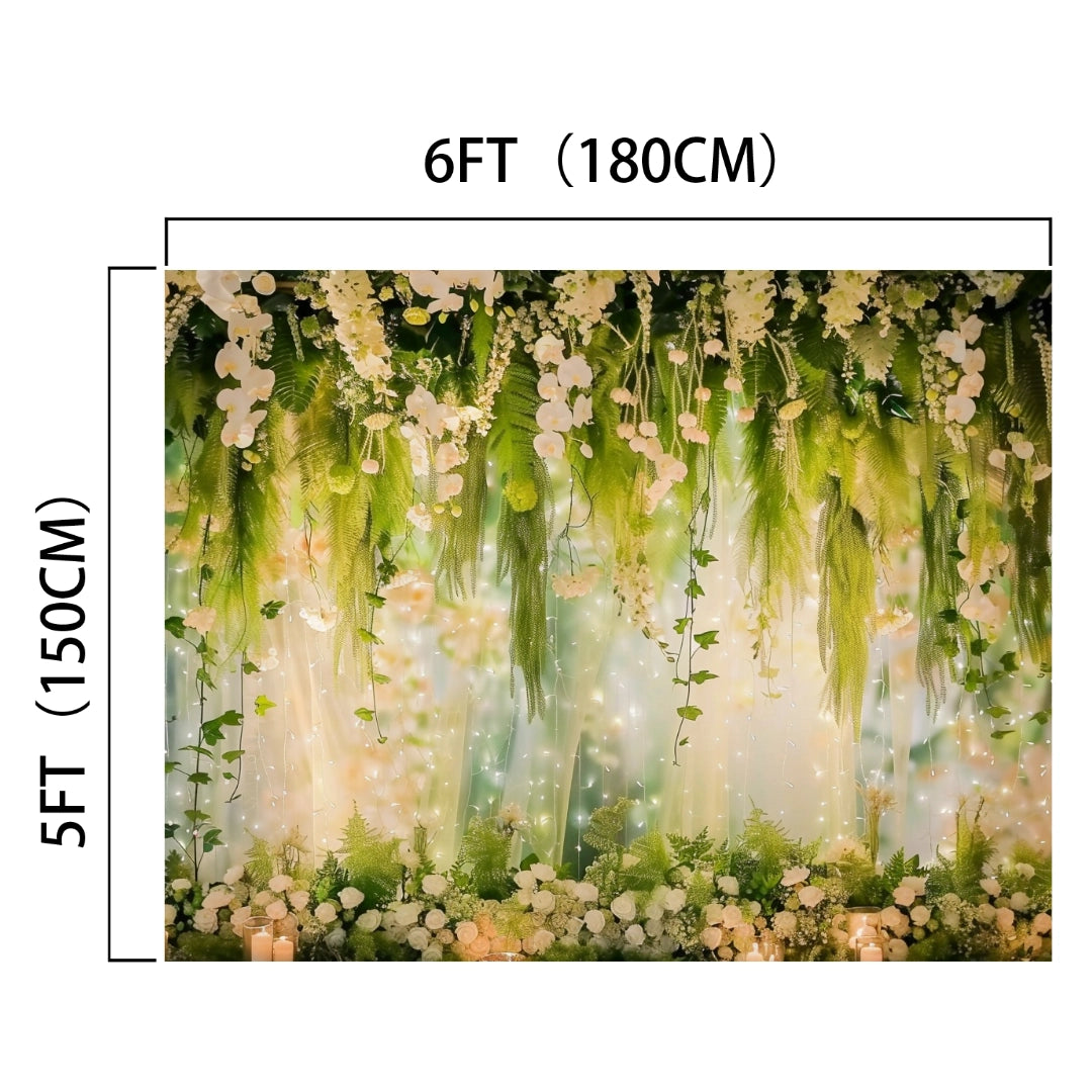 Romantic Floral Weddings Photography Backdrop - ideasbackdrop measuring 6 feet by 5 feet featuring hanging green foliage, white flowers, and fairy lights—perfect for adding floral splendor to your event decor.