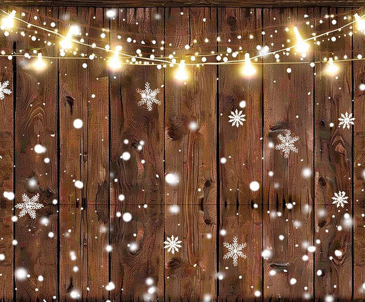A wooden deck is decorated with string lights and snowflakes, both falling and attached, creating a retro-themed party atmosphere against an ideasbackdrop Rustic Glitter Background Wood Backdrop-ideasbackdrop.