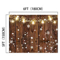 A 6ft by 5ft Rustic Glitter Background Wood Backdrop-ideasbackdrop adorned with string lights and snowflake decorations, perfect for capturing nostalgic shots.