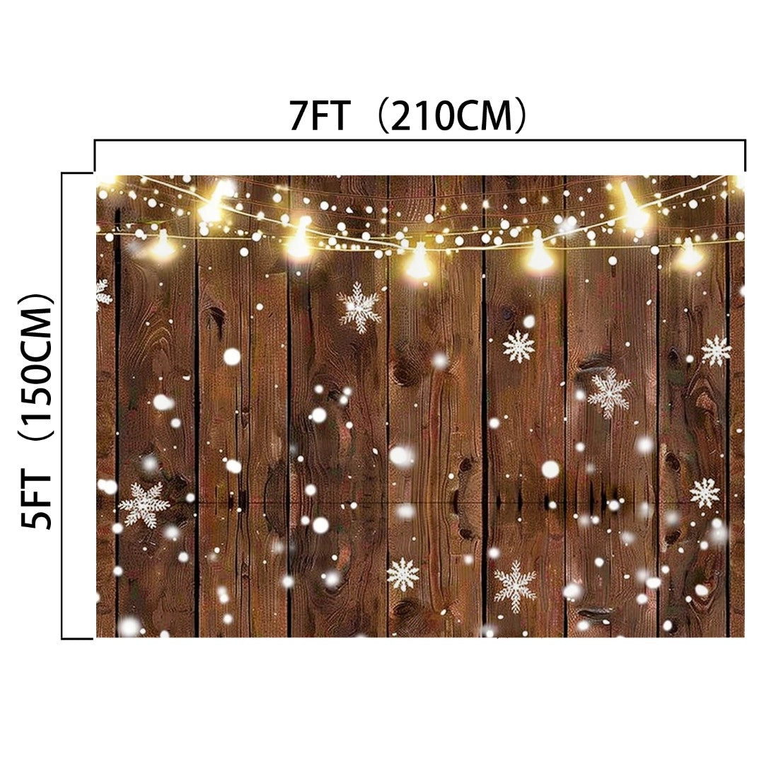 A 7ft by 5ft Rustic Glitter Background Wood Backdrop-ideasbackdrop adorned with hanging lights and snowflake decorations, perfect for capturing nostalgic shots.