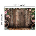 Rustic Wood Barn Wall Leaves Flower Backdrop -ideasbackdrop with HD vivid flower decorations and wagon wheels, measuring 7 feet by 5 feet (210cm by 150cm) from ideasbackdrop.