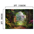 A 5ft by 3ft Rustic Wood Gate Arched Door Floral Backdrop-ideasbackdrop featuring a garden pathway through an arched stone entrance, surrounded by lush greenery and colorful flowers, leading to a distant castle. The stunning visuals create a captivating scene that will enhance any setting with its HD quality.