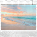 A poster depicting a serene beach scene with gentle waves and a pastel-colored sunset, hanging against a white brick wall with spotlights above. This Seaside Beach Sunrise Sea Wave Backdrop - ideasbackdrop adds a touch of tranquility to any room.