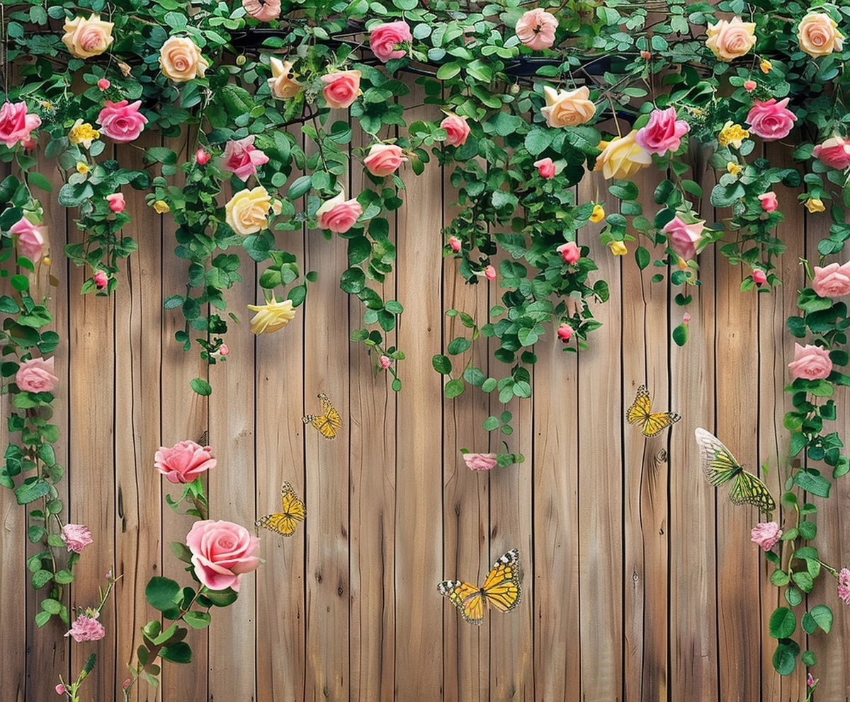 A wooden fence decorated with climbing rose vines bearing HD flowers in pink and yellow, with several butterflies fluttering around, serves as a perfect Spring Floral Wood Plank Photoshoot Flowers Backdrop -ideasbackdrop for event decorators by ideasbackdrop.