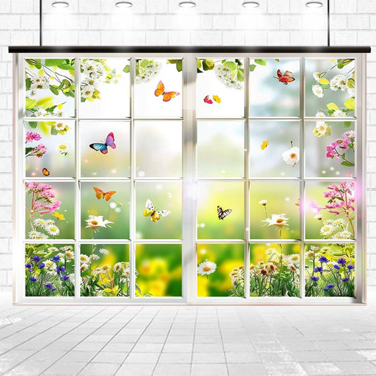 A brightly colored floral window mural featuring photorealistic flowers and butterflies arranged in a grid pattern, set against a Spring Photography Green Grass Window Backdrop-ideasbackdrop by ideasbackdrop.