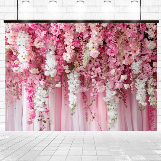 A romantic setting at weddings, featuring a backdrop of hanging pink and white flowers against a light-colored brick wall, creating a Spring Pink Rose Romantic Flower Backdrop -ideasbackdrop by ideasbackdrop for a realistic floral display.