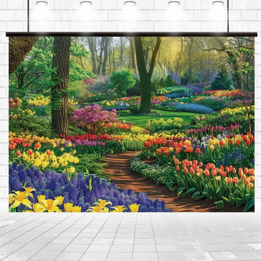 A vibrant garden scene with a winding path surrounded by various flowers including tulips, daffodils, and hyacinths under a canopy of trees, creating a Spring Tulip Park Photography Flower Backdrop-ideasbackdrop with a romantic touch by ideasbackdrop.