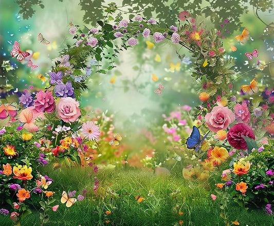 A vibrant, colorful garden with various flowers in full bloom and butterflies fluttering around, creating an archway effect. Lush green grass and trees in the background enhance the serene atmosphere, making it a perfect floral backdrop for HD photography with the Spring Watercolor Butterfly Flower Backdrop by ideasbackdrop.