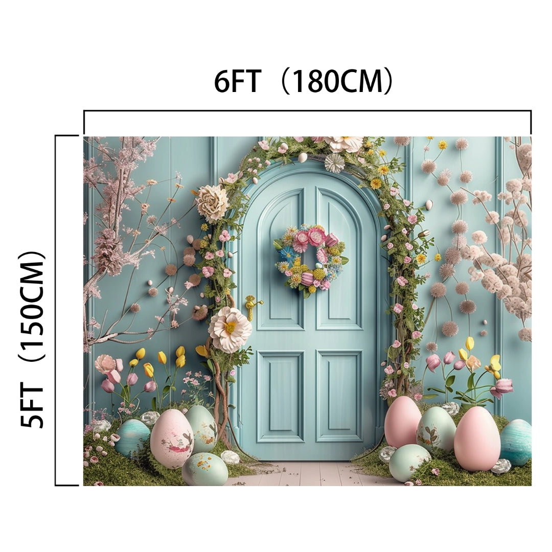 A blue arched door adorned with a floral wreath, surrounded by pastel-colored flowers and oversized Easter eggs, creates a magical decor. Perfect for home staging, this enchanting Spring Easter Garden Bunny Eggs Door Backdrop-ideasbackdrop by ideasbackdrop measures 6 feet by 5 feet.