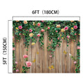 Spring Floral Wood Plank Photoshoot Flowers Backdrop -ideasbackdrop with HD flowers, hanging vines, and roses, accented by several butterflies. Ideal for event decorators, the dimensions are 6 feet (180 cm) wide and 5 feet (150 cm) tall.