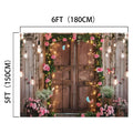 A decorated wooden door surrounded by ultra-realistic floral designs, hanging lights, and greenery. The dimensions indicated are 6FT (180CM) by 5FT (150CM), creating an **ideasbackdrop Spring Photography Backdrop Wooden Barn Door - ideasbackdrop** that enhances the elegant backdrop of any setting.