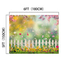 A 6FT by 5FT Spring Flowers Kids Birthday Pink Floral Backdrop -ideasbackdrop featuring a white picket fence with flowers and greenery in the foreground, and a blurred colorful background with floating petals. Perfect for online meetings, this digital image adds a touch of nature to your virtual space.