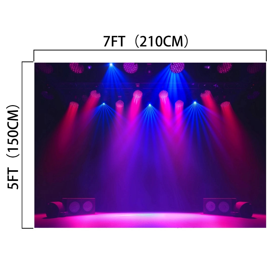 Stage with colorful lighting in blue and pink hues, featuring a high-resolution printed backdrop. Dimensions labeled as 7 feet (210cm) wide and 5 feet (150cm) tall. Two speaker boxes lighted on stage sides, all with impressive wrinkle resistance. Product: 7x5FT Theater Backdrop Spotlight Stage Background for Photoshoot Photography Gloomy Night Scenic Birthday Studio Prop by ideasbackdrop.