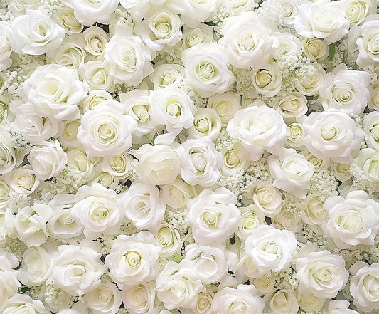 A dense arrangement of white roses and small white flowers fills the frame, creating a vivid floral backdrop perfect for social events. This monochromatic setting is truly an Instagram-worthy setup with the White Floral Photography Flower Backdrop for Party by ideasbackdrop.