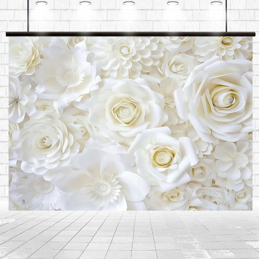A photogenic setting featuring an arrangement of large, white, paper flowers is set against a white brick wall and illuminated by several lights from above, creating a White Flower Bridal Photos Wedding Backdrop-ideasbackdrop perfect for your dream wedding.
