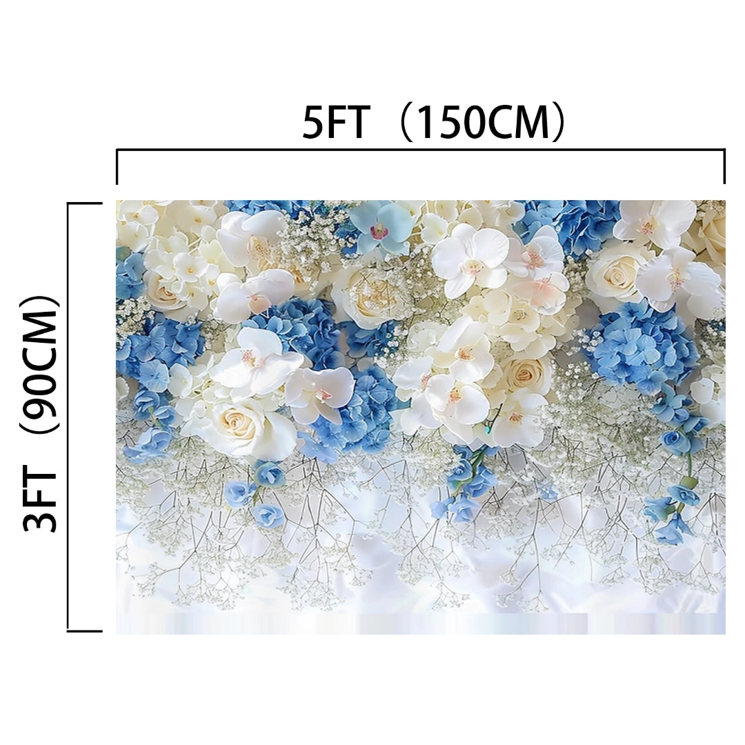 White Blue Rose Party Floral Backdrop by ideasbackdrop, measuring 5 feet (150 cm) wide and 3 feet (90 cm) tall, perfect for photographers capturing stunning portraits, adorned with white and blue flowers and delicate greenery.